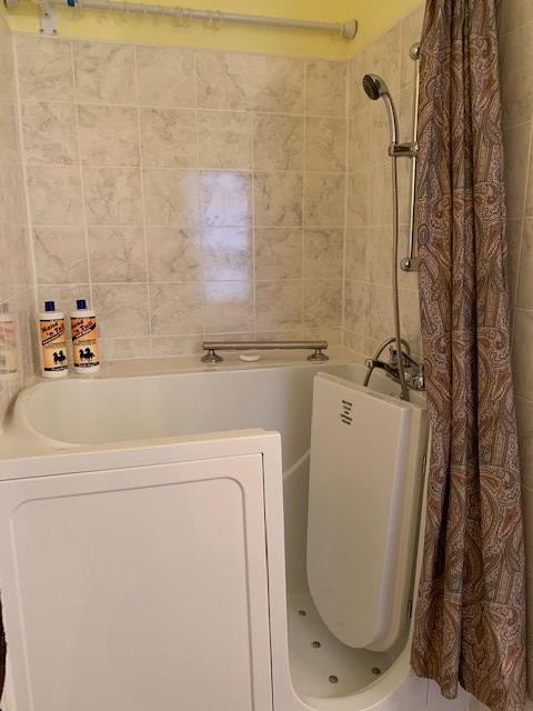 bathroom featuring washer / clothes dryer