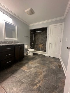 full bathroom featuring toilet, vanity, baseboards, walk in shower, and crown molding