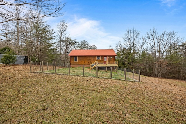 view of yard featuring a wooden deck