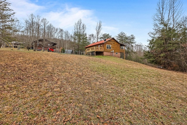 view of yard with a wooden deck