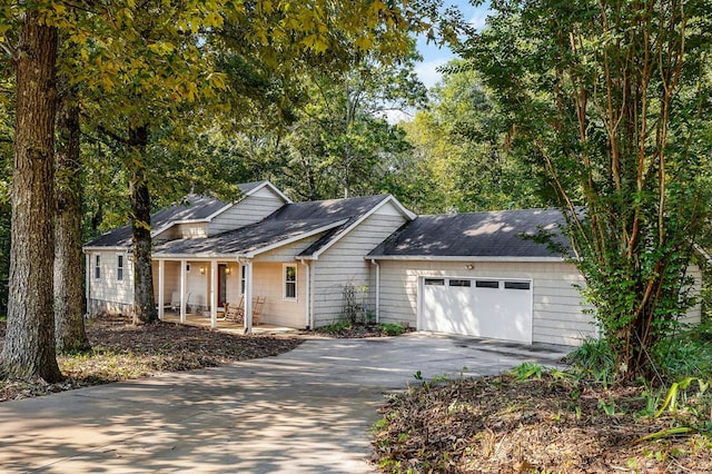 view of front of property with a garage and driveway