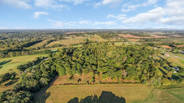 birds eye view of property featuring a rural view