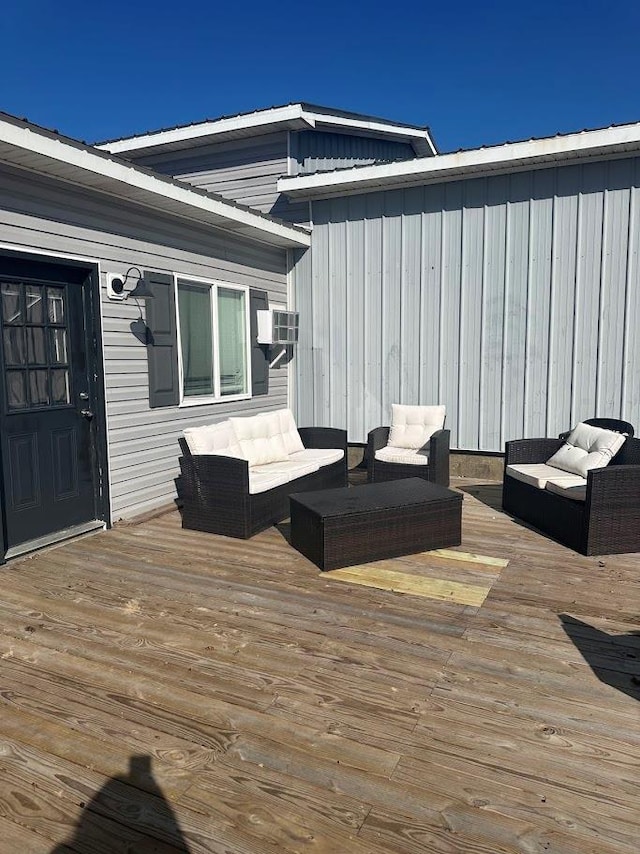 deck with an outdoor hangout area