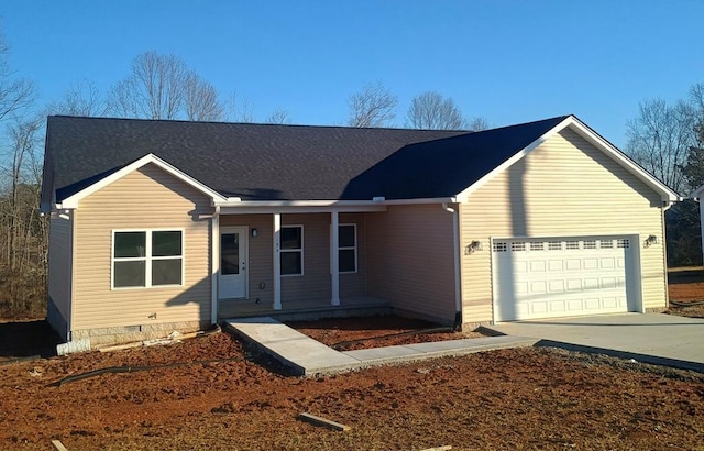 ranch-style house featuring a garage, concrete driveway, a porch, and crawl space