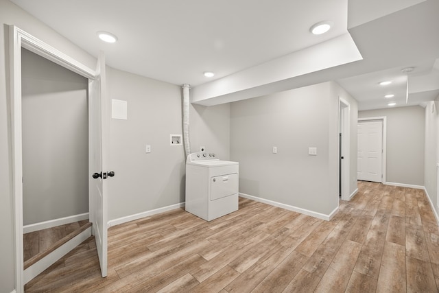 laundry area featuring recessed lighting, washer / dryer, light wood-type flooring, laundry area, and baseboards