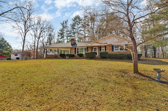 single story home with a front yard and a chimney