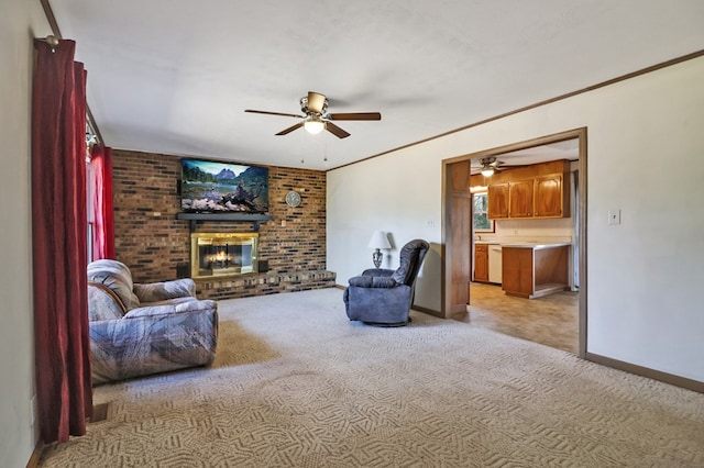 living room featuring a fireplace, baseboards, ornamental molding, and light colored carpet