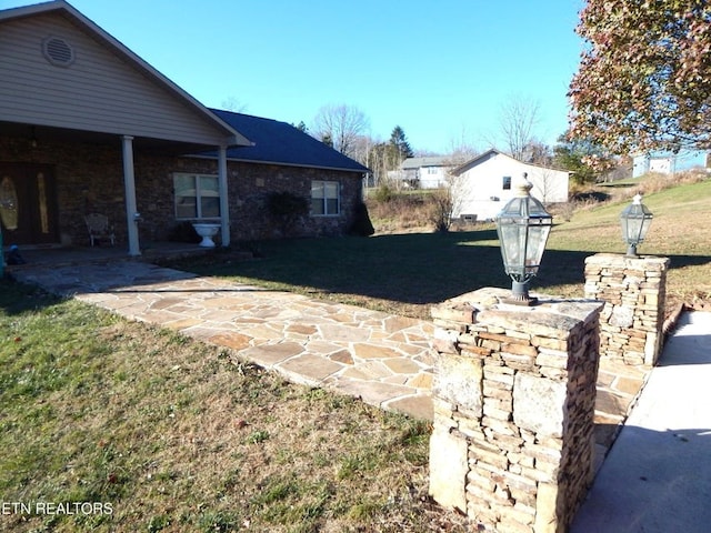 view of yard with a patio area