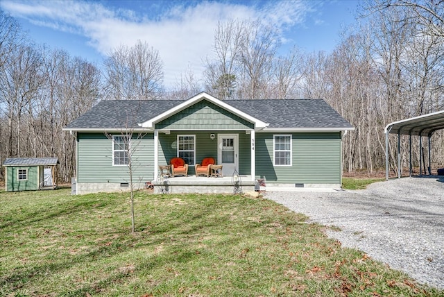 view of front of property featuring a storage unit, a porch, crawl space, and gravel driveway