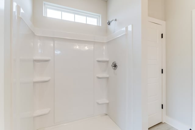 full bathroom with a shower