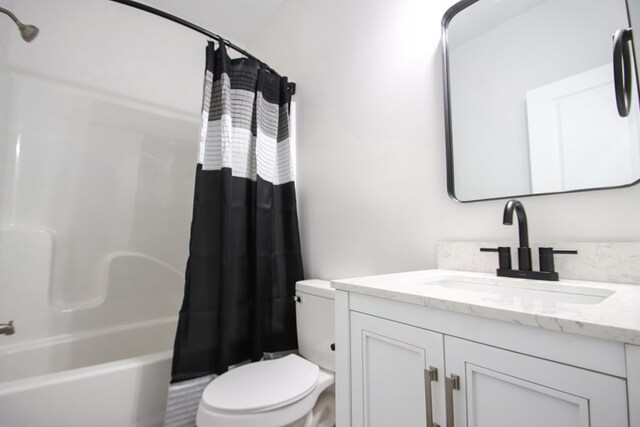 full bath with toilet, shower / bath combination with curtain, and vanity