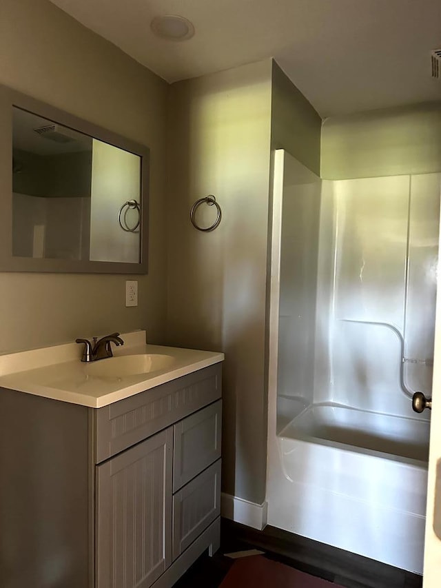 full bath with visible vents and vanity