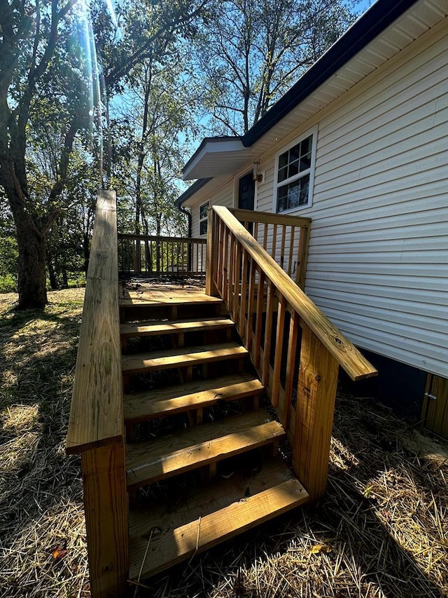 deck featuring stairway