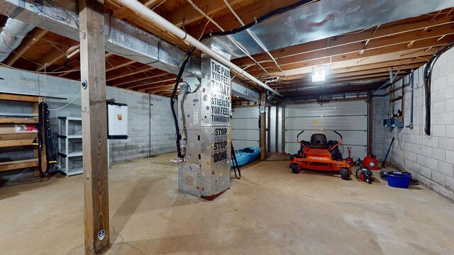 interior space with heating unit and concrete block wall