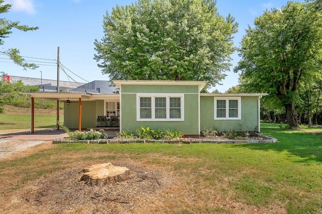 exterior space with a front yard