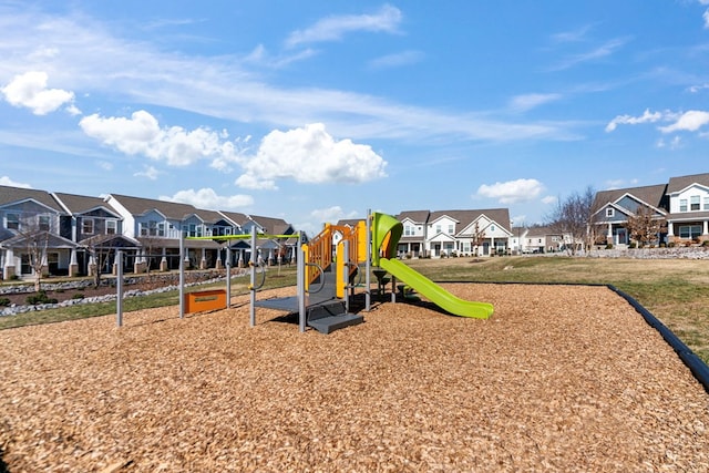 community jungle gym with a residential view