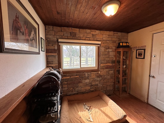 laundry room featuring wood ceiling and wood finished floors