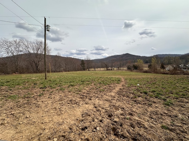 view of mountain feature with a rural view