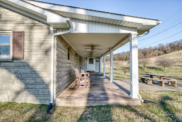 view of patio featuring a ceiling fan