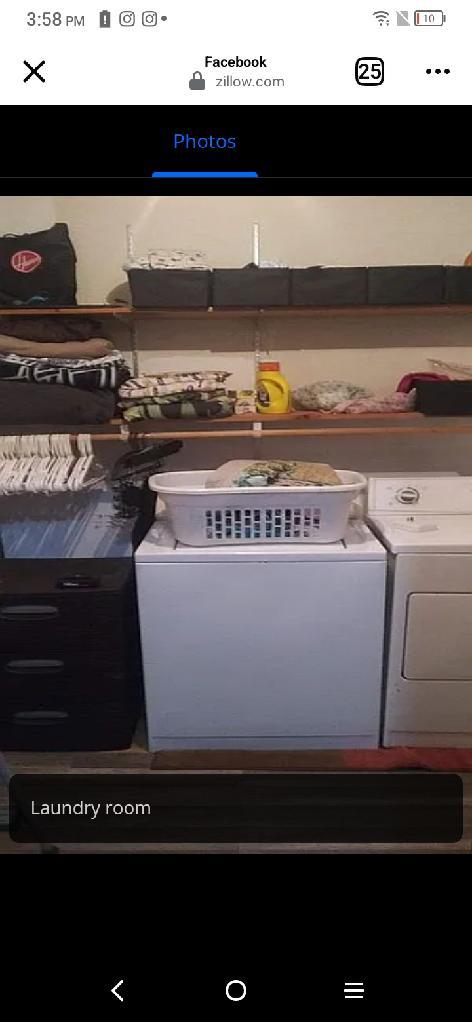 clothes washing area featuring laundry area and washer and dryer