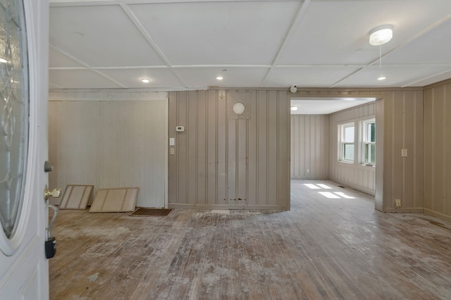 spare room featuring wood finished floors