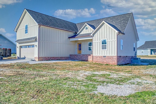 modern inspired farmhouse with board and batten siding, a shingled roof, an attached garage, and central air condition unit