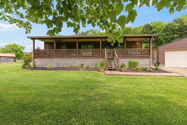 view of front of property featuring log exterior, a front yard, and a garage