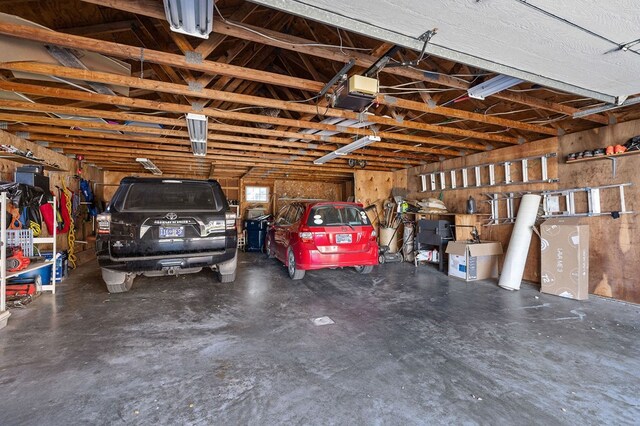 garage featuring a garage door opener