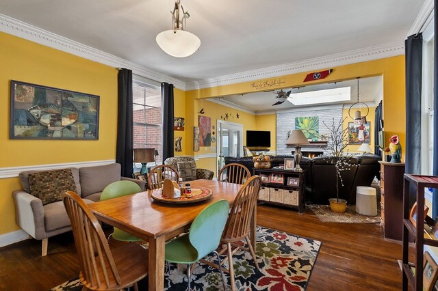 dining area featuring a wall mounted AC, dark wood finished floors, and crown molding