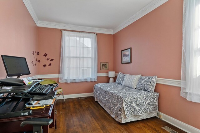 bedroom featuring ornamental molding, dark wood-type flooring, visible vents, and baseboards