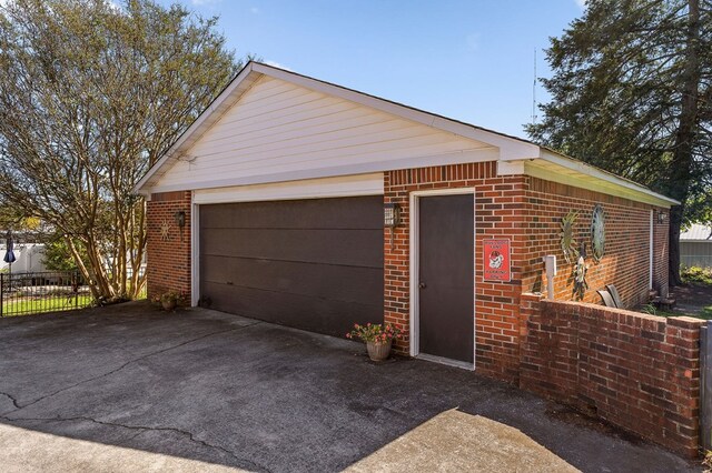 detached garage with fence