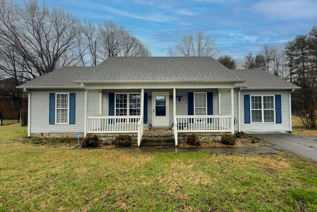 ranch-style house featuring crawl space, roof with shingles, a porch, and a front yard