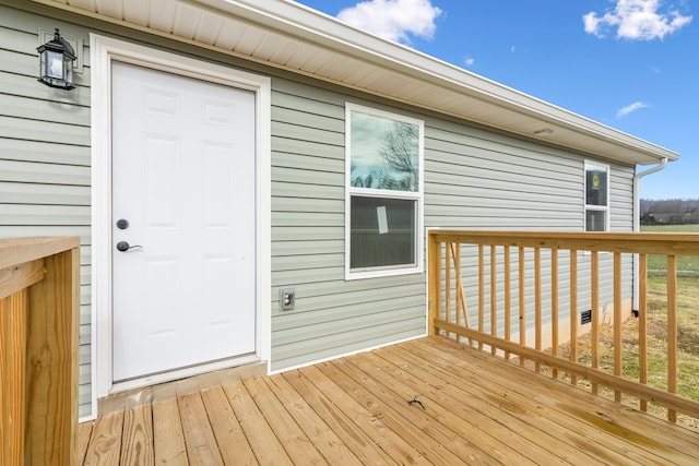 doorway to property featuring a deck