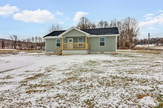 view of front of property featuring a porch, crawl space, and a shingled roof