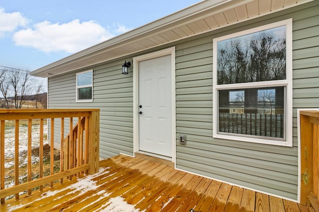 view of snow covered deck