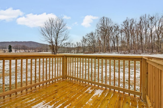 view of snow covered deck