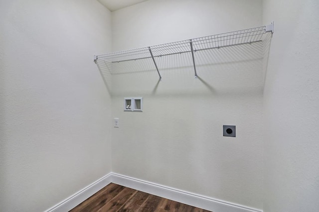 washroom featuring hookup for a washing machine, hookup for an electric dryer, wood finished floors, laundry area, and baseboards