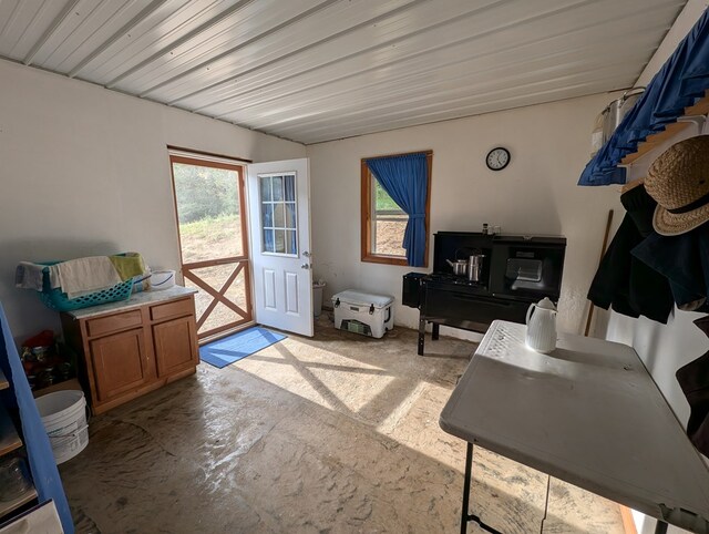 living area with concrete flooring