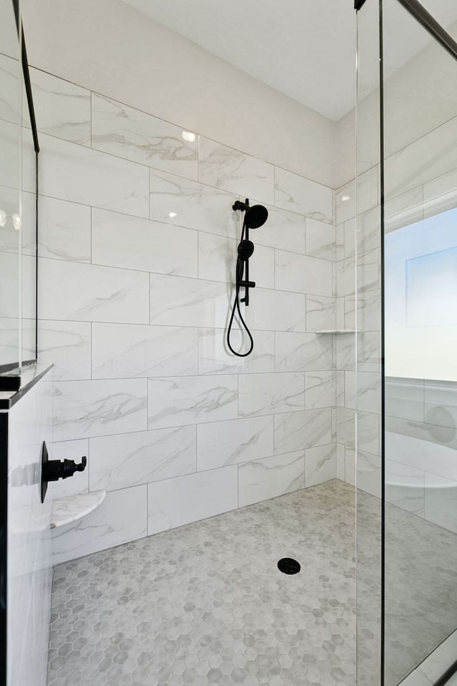 bathroom featuring walk in shower