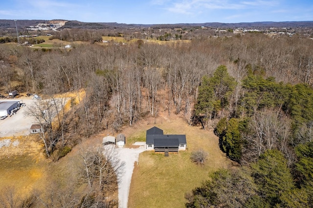 bird's eye view featuring a forest view