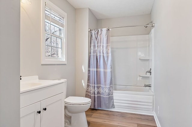 full bath featuring shower / bath combination with curtain, vanity, toilet, and wood finished floors