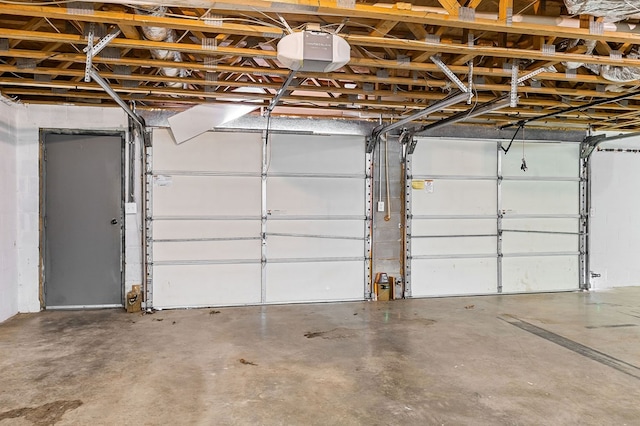 garage featuring a garage door opener