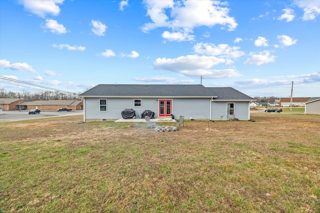 back of house with a yard, french doors, crawl space, and a patio area