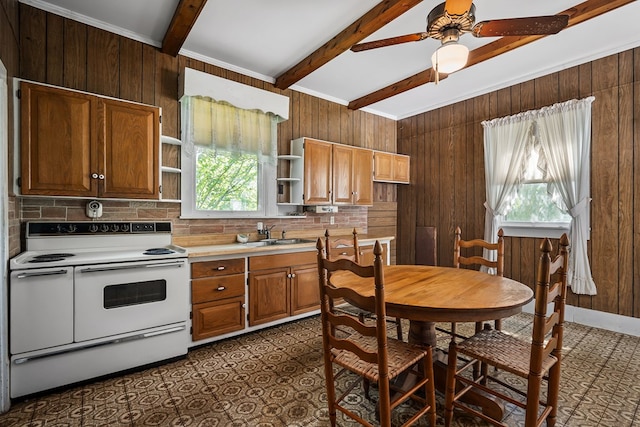 kitchen with wooden walls, light countertops, open shelves, and double oven range