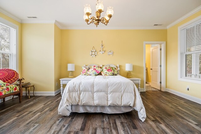 bedroom featuring dark wood-style floors, a notable chandelier, ornamental molding, and baseboards