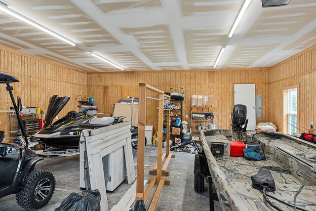 interior space featuring a workshop area and electric panel