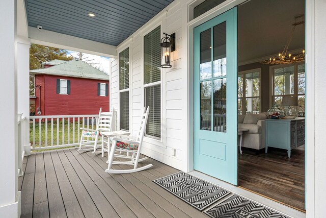 wooden deck featuring covered porch