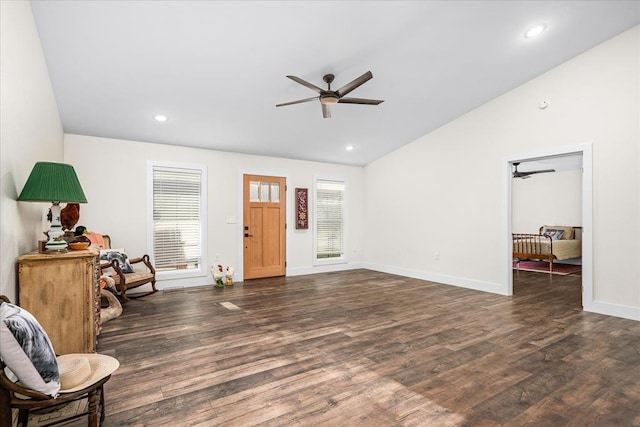 interior space featuring dark wood-style floors, recessed lighting, vaulted ceiling, and ceiling fan