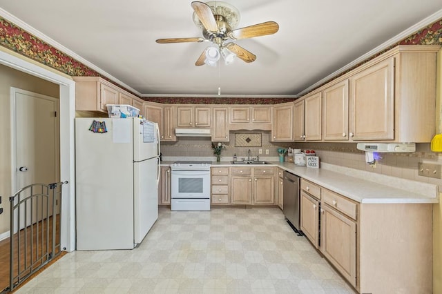 kitchen with white appliances, light floors, a sink, and light brown cabinetry