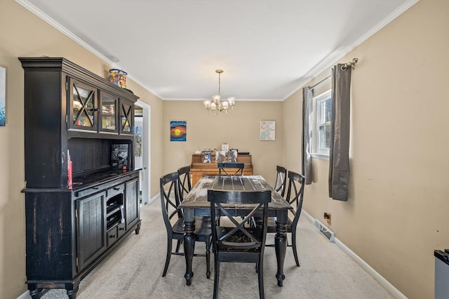 dining space with light colored carpet, crown molding, and baseboards